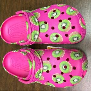 CROCS Pink and Green Sandals with Playful Design